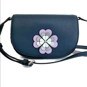 Adorable blue Kate Spade crossbody bag with flower